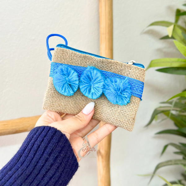 Porte monnaie à pompons