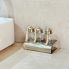 Set de 3 bouteilles en verre avec support en laiton argenté salle de bain