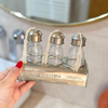 Set de 3 bouteilles en verre avec support en laiton argenté salle de bain