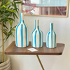 Vase bouteille bleu ciel rayé