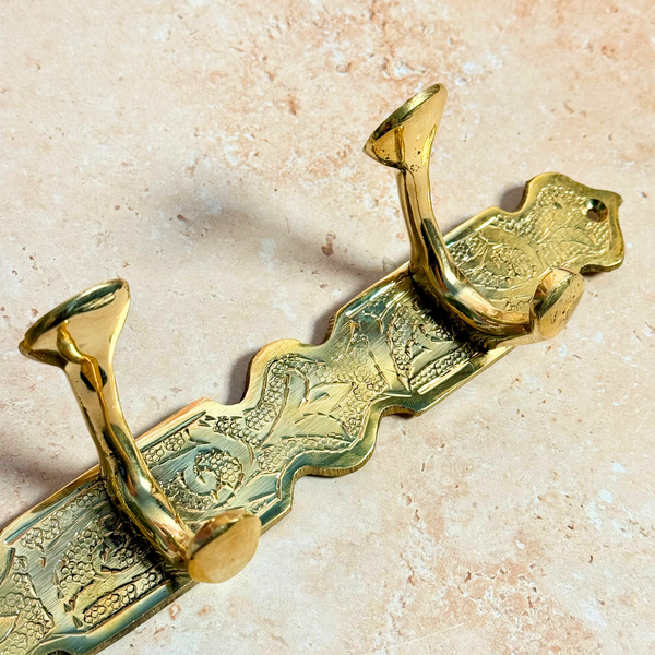 Barre murale à 4 crochets en laiton doré Zwak