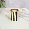 Bougie artisanale rayée en terre cuite parfum Oud