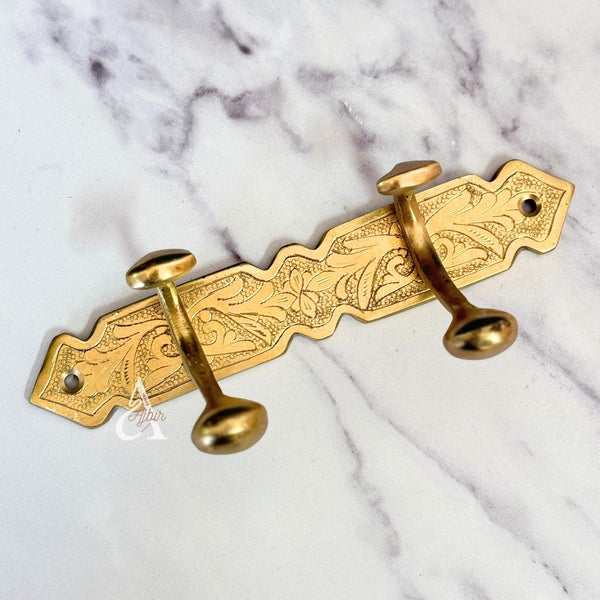 Barre murale à 2 crochets en laiton doré gravé