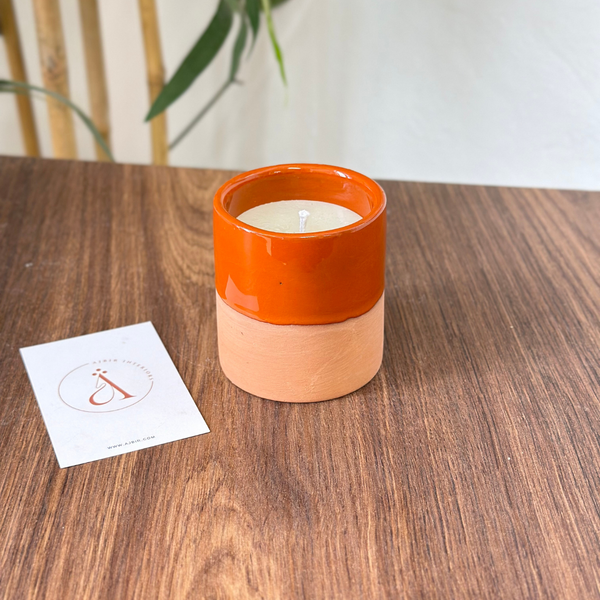 Bougie artisanale orange en terre cuite parfum Musk