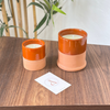 Bougie artisanale orange en terre cuite parfum Musk