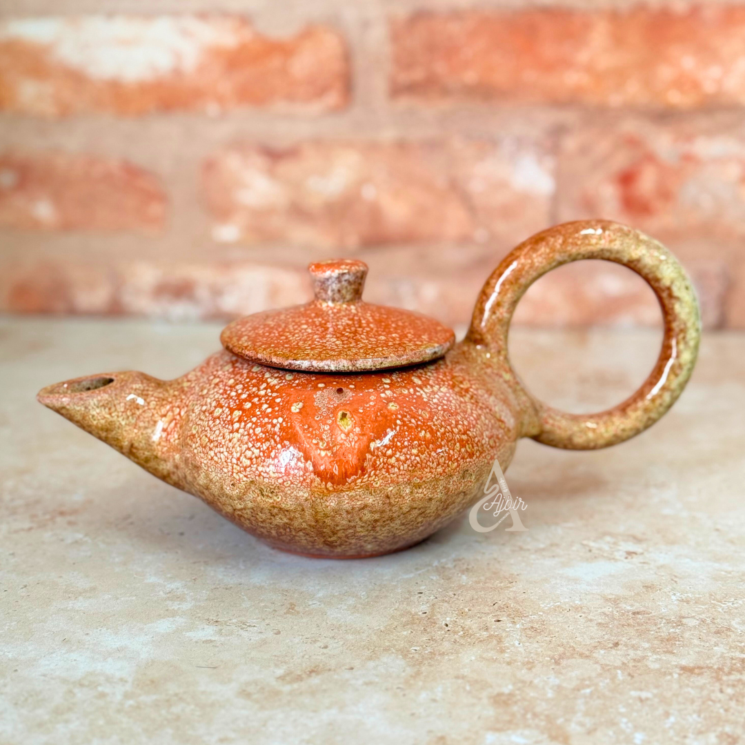 Théière en céramique moucheté