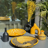 Petit panier tagine à pompon orange et noir - Ajbir