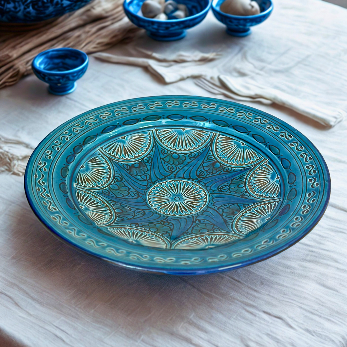 Assiette Nakch bleu pétrole 35cm