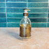 Distributeur de savon en verre et laiton doré martelé grand