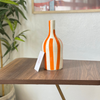 Vase bouteille orange rayé