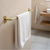 Barre porte-serviette murale en laiton doré 50 cm