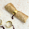 Ronds de serviette de table en laiton doré à pompons (Lot de 4)