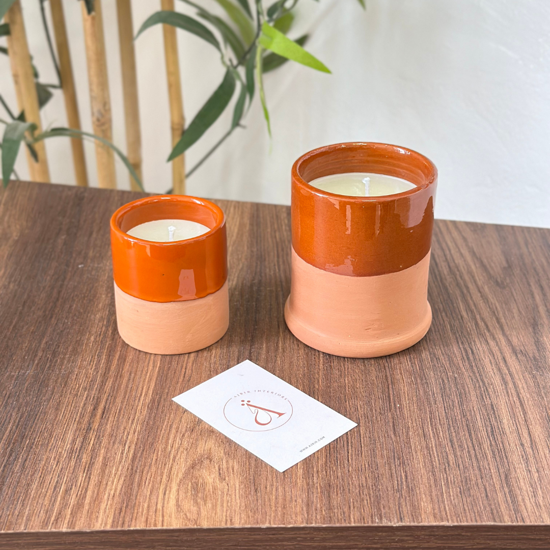 Bougie artisanale orange en terre cuite parfum Musk